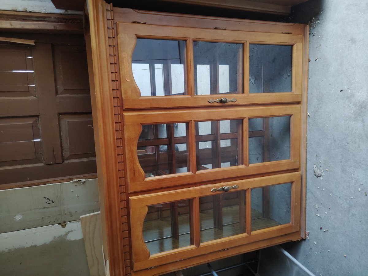 Wooden cabinet with glass doors slightly worn condition