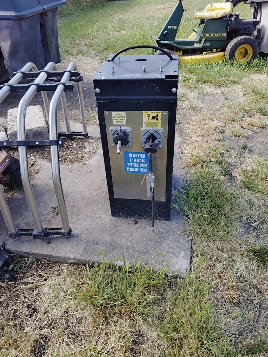 Black outdoor utility box with two outlets and handle